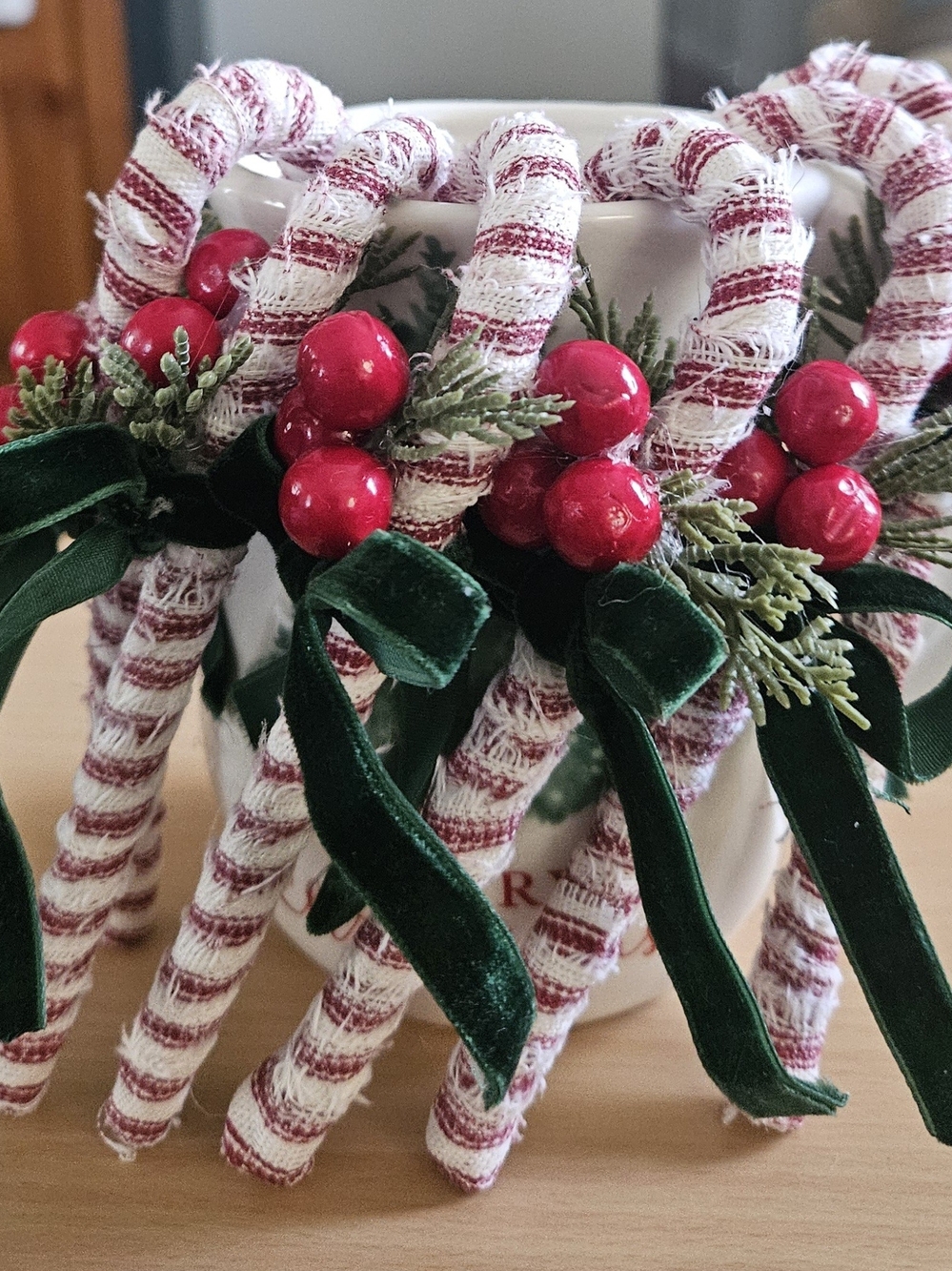 Five Festive Candy Canes with Red Berries and Green Velvet Bows
